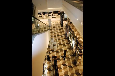 A tessellated floor pattern leads visitors’ eyes along the walkways